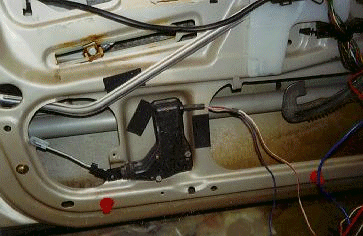 1.  Motor and linkage rod mounted on door